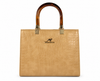 Camel Croc-Texture Handbag on Minimalist Luxury Podium Background