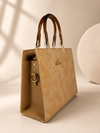 Camel Croc-Texture Handbag on Minimalist Luxury Podium Background