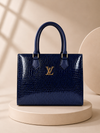 Navy Blue Croc-Texture Handbag on Minimalist Luxury Podium Background